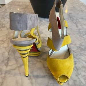 Rare Cesare Paciotti yellow suede heels with red bottom & dagger logo